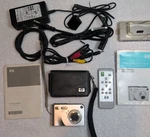 Camera Hp Photosmart R607 Instant Share With Wires Dock Remote Manual. Fixed Price $30.00.