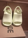 Yeezy Slide Infant Size 5K Glow Green (HQ4119) Made By Adidas With Box. Fixed Price $50.00.